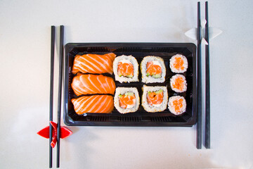 California sushi rolls set on the stone plate, sushi delivery set