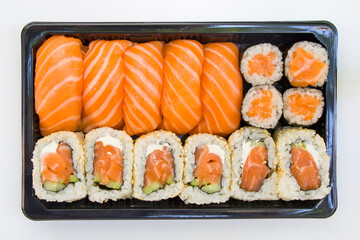 California sushi rolls set on the stone plate, sushi delivery set