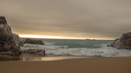 beautiful sunset on the beach in warm tones