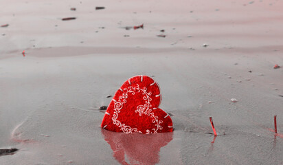 the heart on the sand of the sea