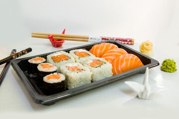 California sushi rolls set on the stone plate, sushi delivery set
