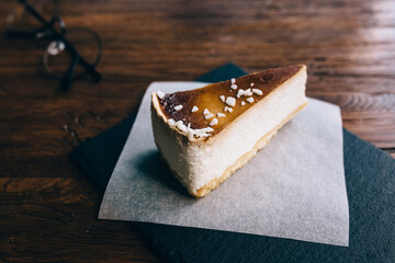 Cheesecake on a wooden table. top view, flat lay