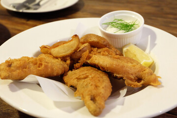 Traditional British Fish and Chips with Tartar sauce