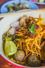 Khao soi - Traditional Thai Food, Thai curry with  A noodle dish in a yellow curry with chicken. 
Khao soy a famous northern Thai food
