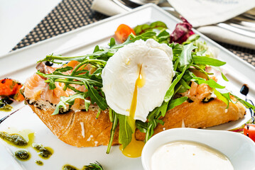 sandwich with salted salmon and poached egg