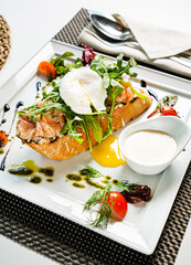 sandwich with salted salmon and poached egg
