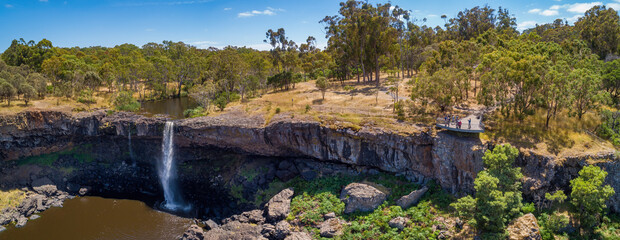 Tourists admiring Wannon Falls from a viewing platform - wide aerial panorama