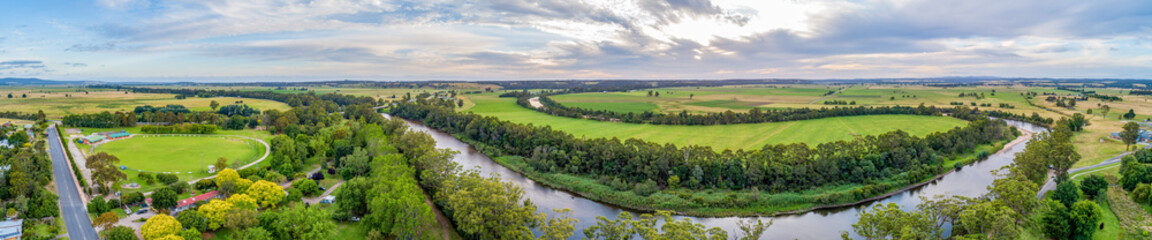 Fototapeta na wymiar Wide aerial panoramic landscape of the Snowy River and fields in Victoria, Australia