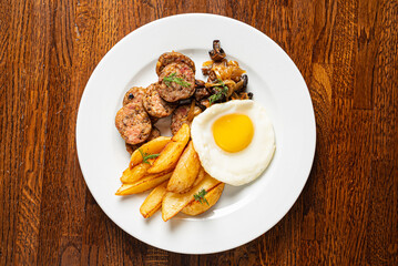 breakfast with fried egg and sausage