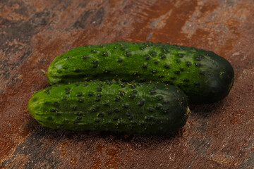Ripe fresh green two cucumbers