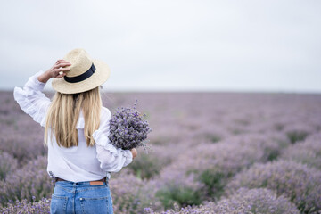 woman in the field with lavender flowers