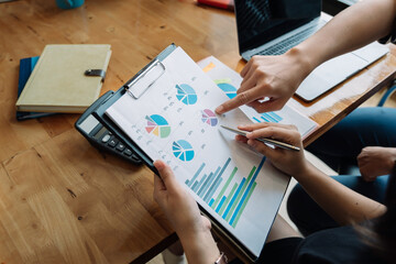 Close up Business People Meeting to analyse and discuss and brainstorming the financial report...