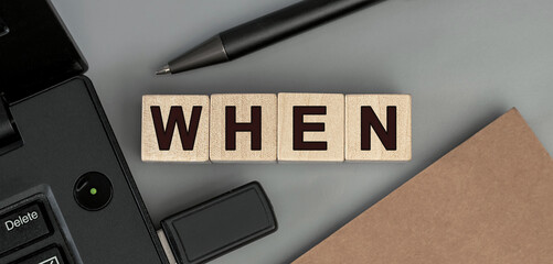 when - word concept from wooden blocks. Top view