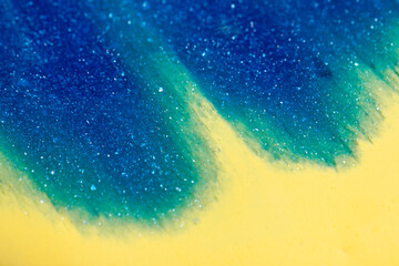 Liquid art gel background. Abstract textured neon background of slime. Macro photo of slime toy for...
