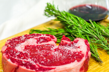 beef fillet, ready for your barbeque and for your lunch, freshly prepared by the butcher and flavored with herbs, rosemary