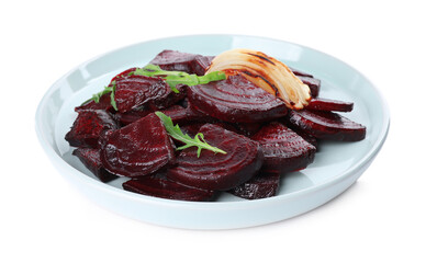 Plate with roasted beetroot slices, arugula and onion isolated on white