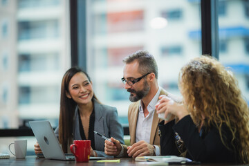 Happy and successful business teamwork with high five.  Friends with stack of hands showing unity and teamwork.