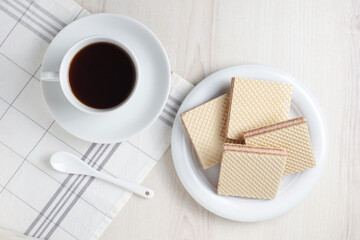 Wafers with filling and coffee