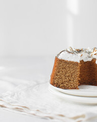 Sliced homemade bundt cake with a toasted meringue topping