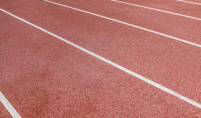 Fototapeta premium Close-up of the markings on the running track at the stadium.