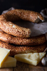 Turkish bagels with cheese on wooden background.