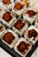 Tiramisu desserts close up. Portion desserts close-up.