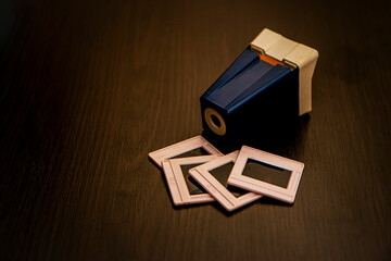 photographic equipment, Portable (handheld) mini slide projector with transparencies, retro slide...