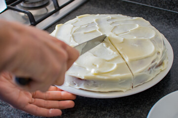 Carrot cake being cut