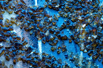 Color abstract background with natural  crashed amber and sand.