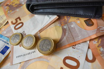 Background of euro notes and coins symbol of the European economy.