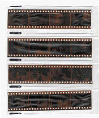 Parts of vintage film in a file. Negative images.