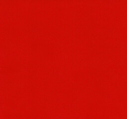 Texture of a bright red fabric. Abstract background.