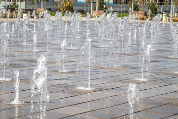 Splashing Water Fountain Water in Motion Blur Close-up Fountain Dripping Water Blurred Background