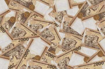 2000 Hungarian forint bills lies in big pile. Rich life conceptual background