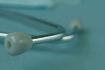 Stethoscope Edic instrument close-up on a blue background