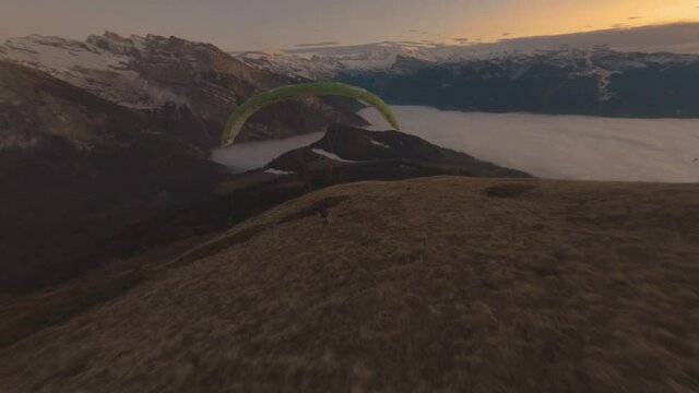 Paragliding - Person Running Down On Hill To Take Off In French Alps During Sunset. - FPV, aerial