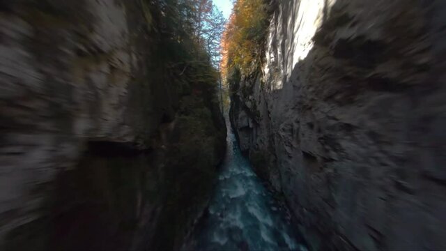 Footbridge Over Gorges des Tines With Autumnal Trees In Sixt-Fer-a-Cheval, France. - FPV superloop
