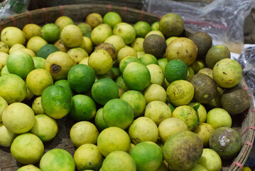 fresh green lime in the traditional market