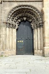 South door of Saint Martin Cathedral in the Plaza do Trigo at the city of Ourense, Galicia, Spain