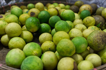 fresh green lime in the traditional market