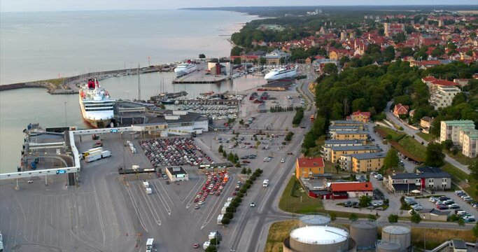Aerial, Ferry arriving with tourists to Visby during Covid-19 Pandemic, Sweden