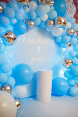 Photo zone with balloons. Boy's birthday decor. Festive decoration. Balloons. Childrens party background. Festive photo zone in blue.