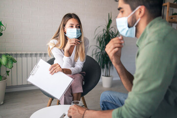 Successful psychotherapist observing patients behavior