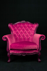 pink Isolated Bergère armchair on black background