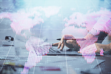 Multi exposure of woman hands typing on computer and business theme hologram drawing. Success...