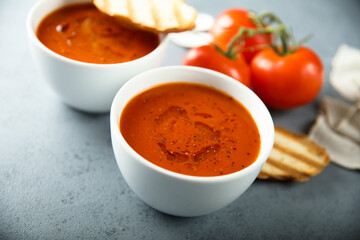 Homemade spicy tomato soup with grilled bread