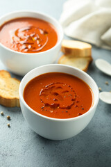 Homemade spicy tomato soup with grilled bread