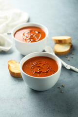 Homemade spicy tomato soup with grilled bread