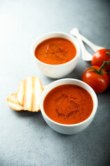 Homemade spicy tomato soup with grilled bread