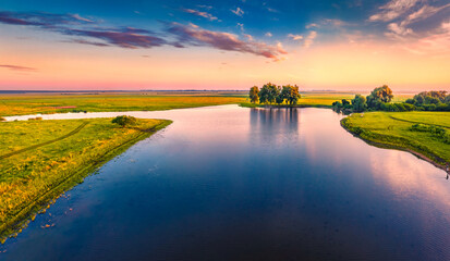 Aerial landscape photography. Fantastic summer sunrise on small lake, Ternopil region. Amazing...
